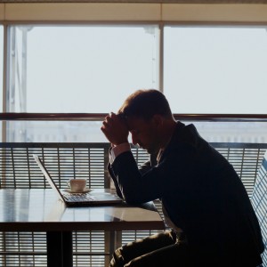 depressed businessman with laptop