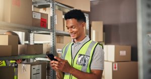 Young logistics professional excited about his new job.