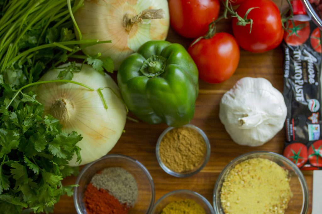 A bunch of grocery store vegetables on a table