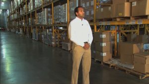 Suni from LePage's discusses his warehouse needs with Evans.