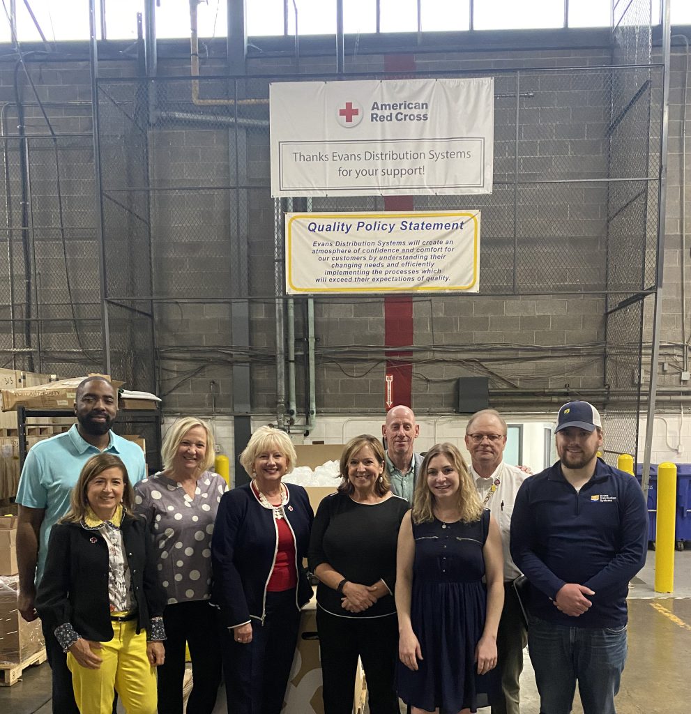 Evans and Red Cross staff in a group photo