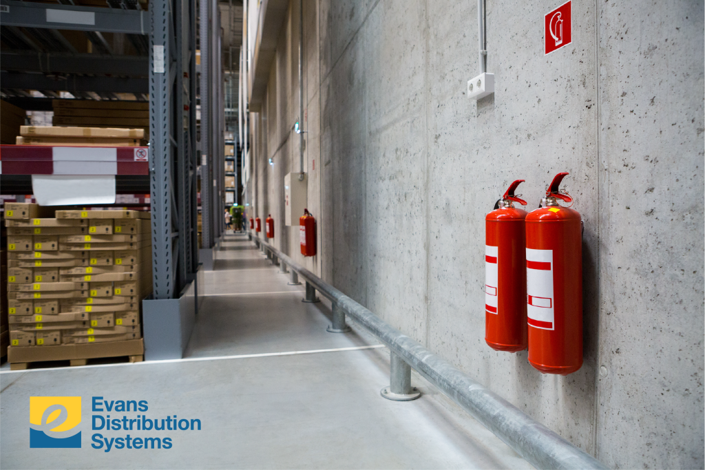 Fire extinguishers in a warehouse facility