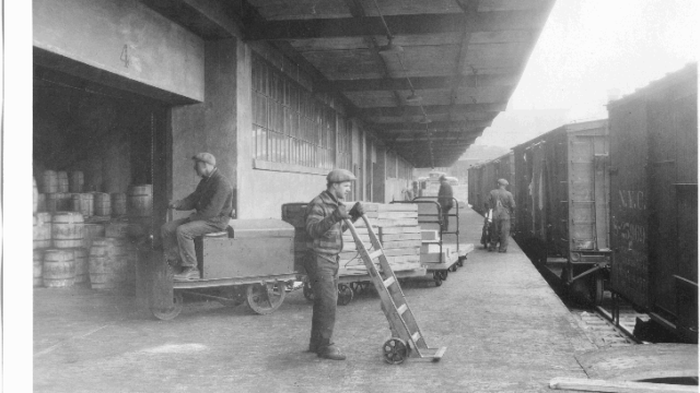 Evans' employee at the load dock, 1930